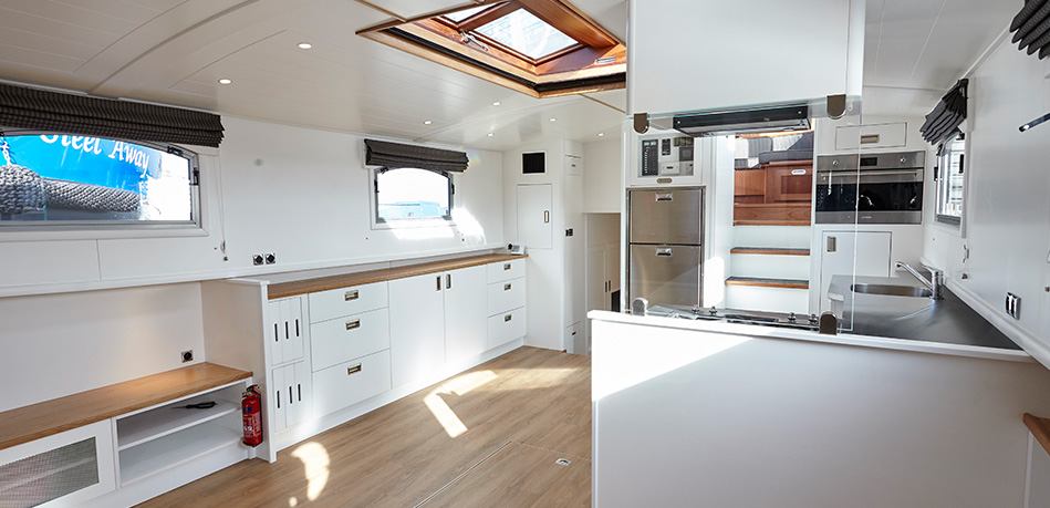 Piper Boats Bespoke designs internal galley kitchen Dutch Barge